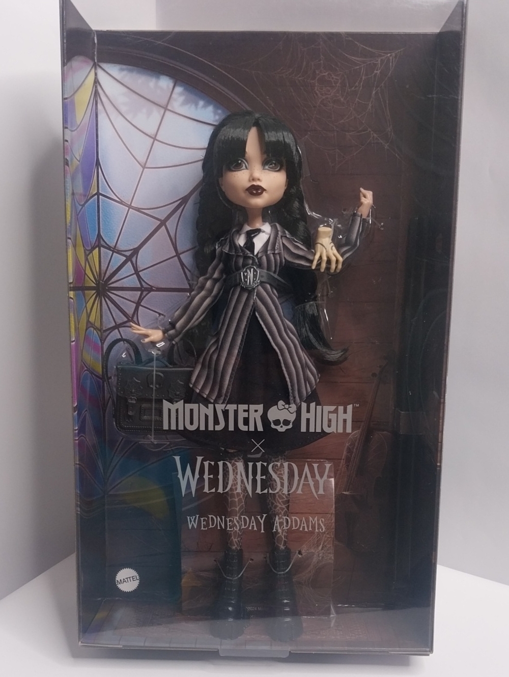 Monster High Wednesday Addams Doll in Black and White Striped Coat